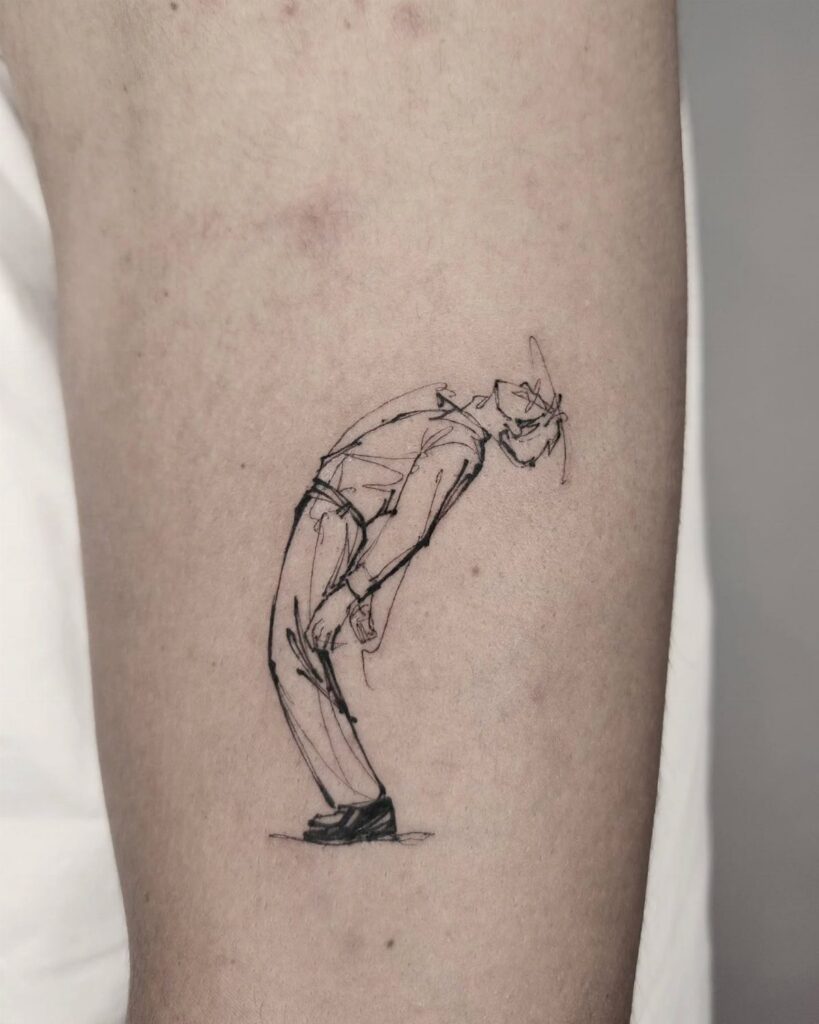 Sketch-style tattoo of a leaning man on a person's forearm in black ink.